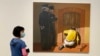 六四事件33周年纪念日前一个多月，香港M+博物馆将隐谕六四事件的画作《新北京》换成图中的另一作品《多疑的人》，引起政治审查的疑虑 (美国之音/汤惠芸)
