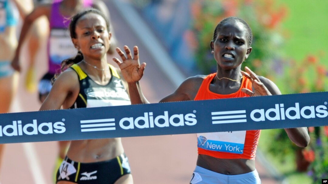 FILE - Runners are seen at the ADIDAS Grand Prix at Icahn Stadium on Randalls Island in New York, June 12, 2010.