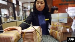 Việt Nam có thể giảm giá tiền đồng trong năm nay
