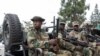 FILE - Ripxe loltoonni M23 rebels loltoota Ruwaandaa as suraa kana irratti hin argamne Gomaa keessatti erga qabamanii booda Ennaa gara daangaa Goomaatti geessan Bitootessa 1, bara 2025