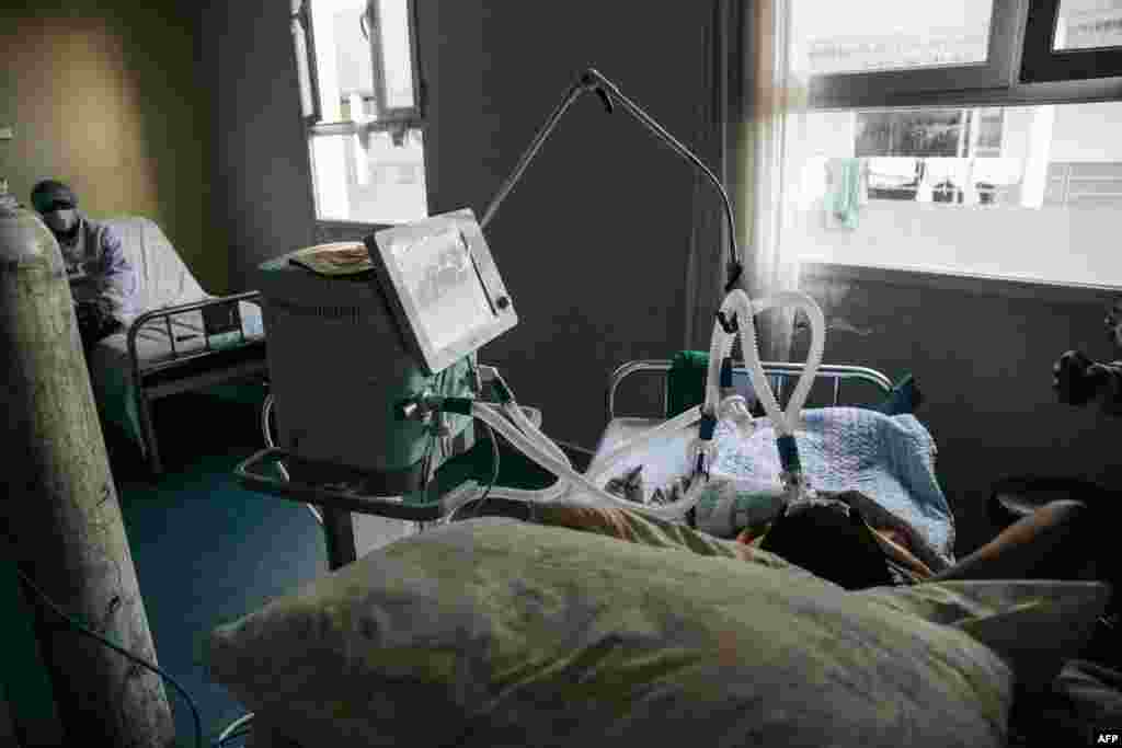 A patient severely infected with COVID-19, is on life support at the Andohatapenaka University Hospital in Antananarivo, Madagascar.