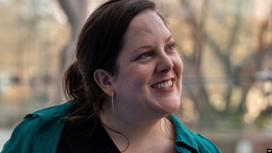 Emily Hollenbeck stands for a portrait at the American Museum of Natural History's Rose Center in New York on Jan. 12, 2024. (AP Photo/Mary Conlon)