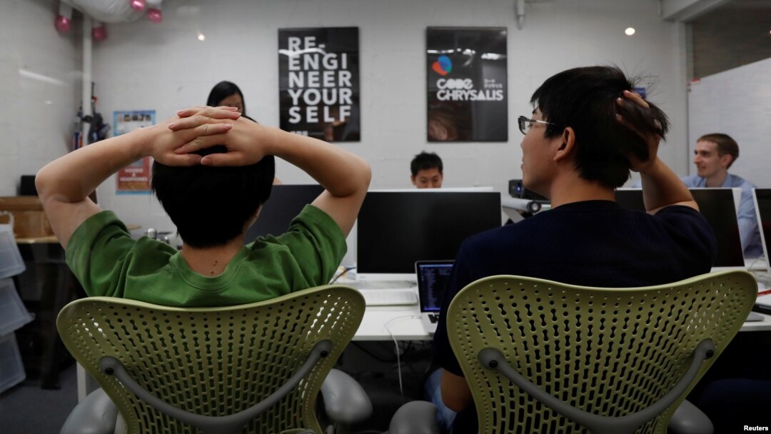 Students attend Code Chrysalis, a software-coding boot camp, at a basement room in Tokyo, Japan, May 23 2018. (REUTERS/Toru Hanai)