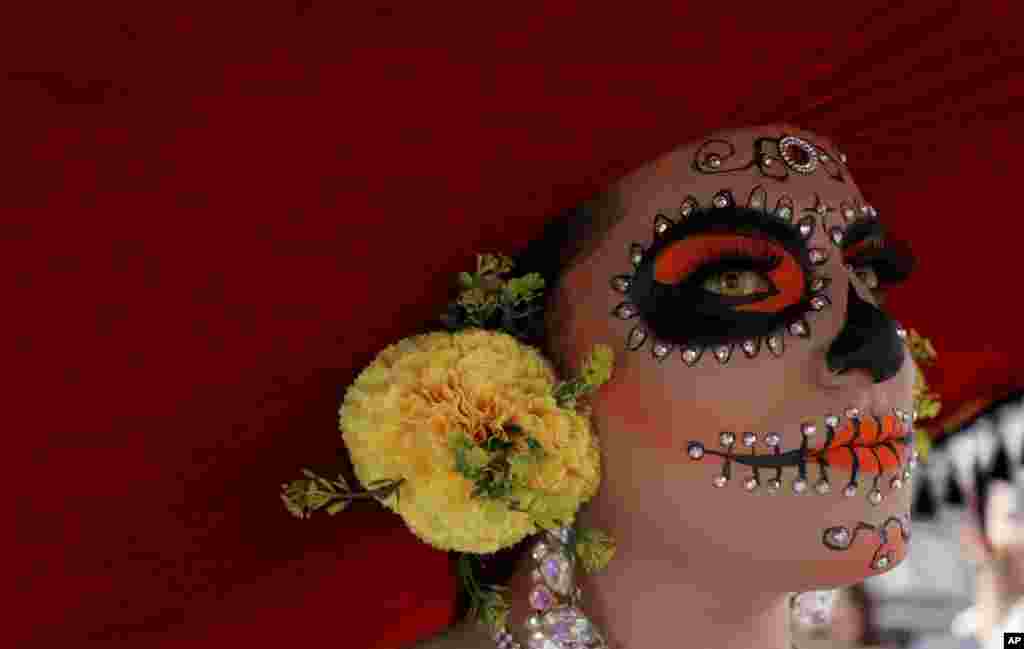A reveler dressed as a Mexican &quot;catrina&quot; participates in the gay pride parade in Bogota, Colombia, June 30, 2019.
